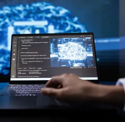 close-up-of-teamworking-it-experts-using-artificia